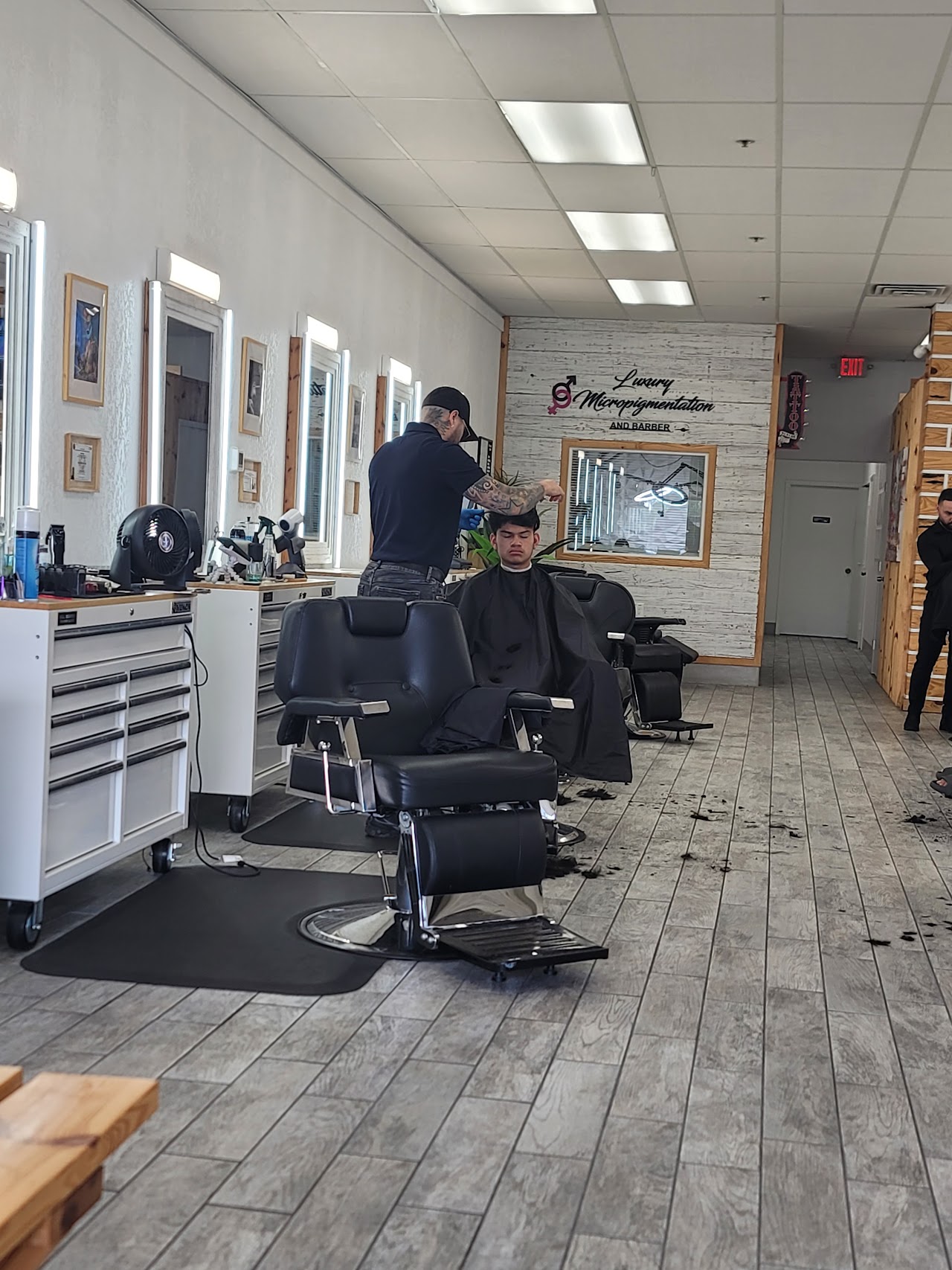 Barber at work at Luxury Barber Shop